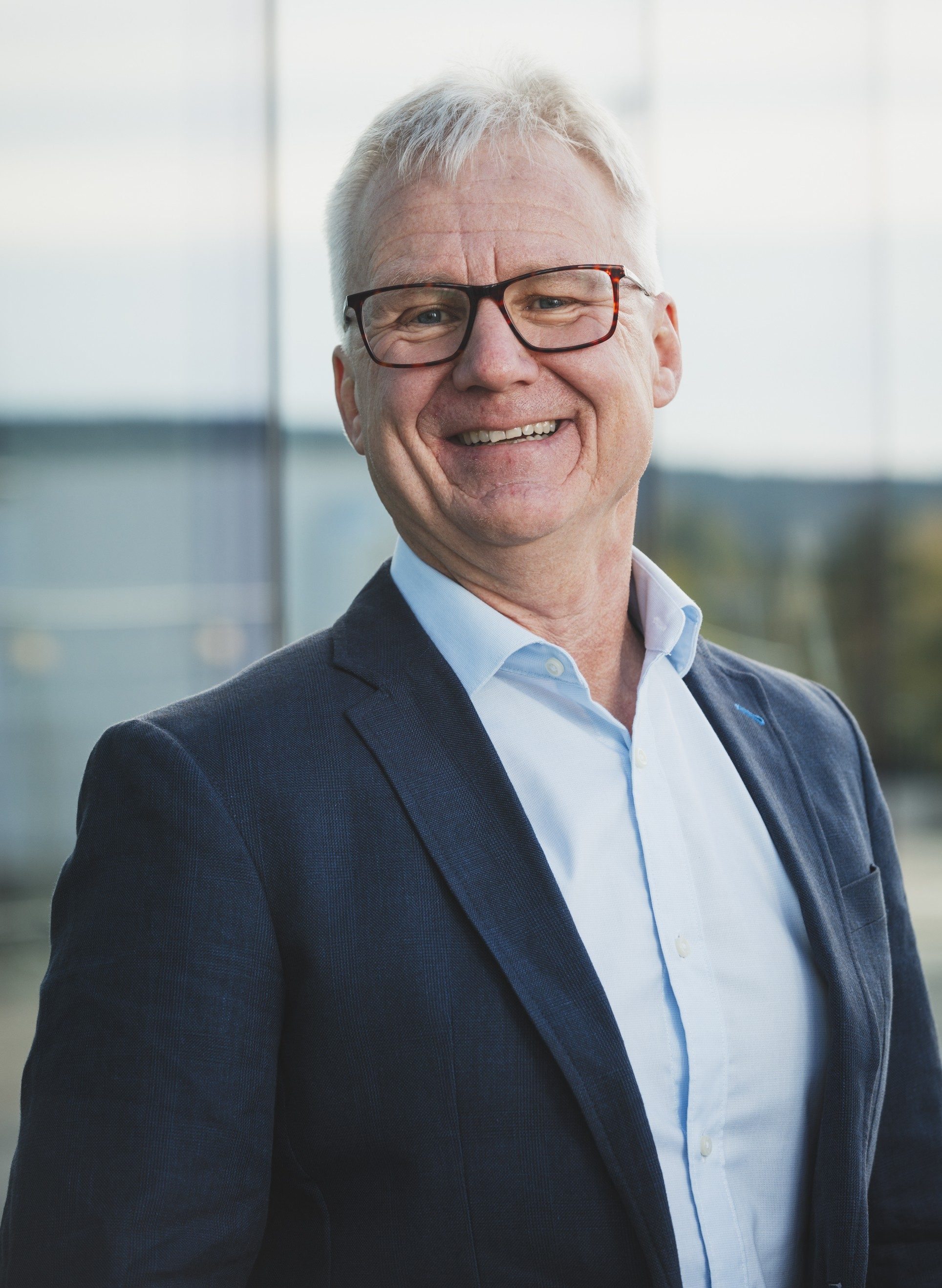 Portrettbilde av mann i dress